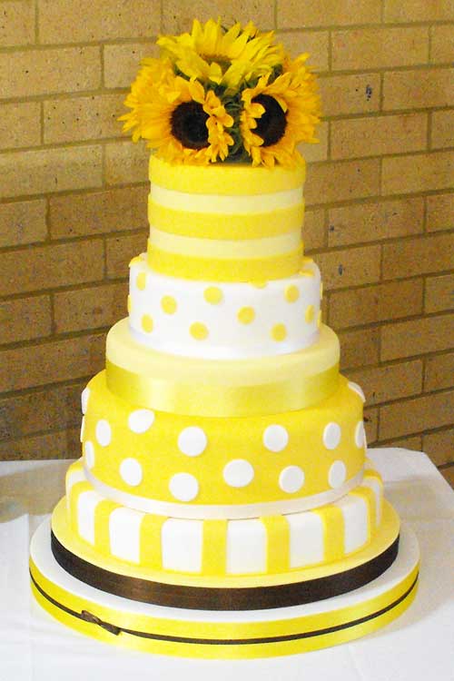yellow flowers wedding cake. where the yellow is :)